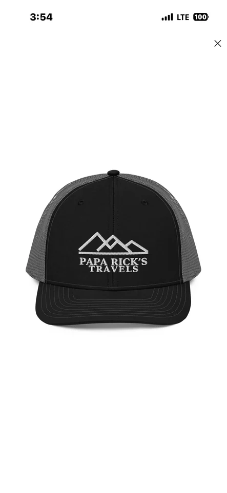 Black and charcoal trucker hat with Papa Rick’s embroidered white mountain logo