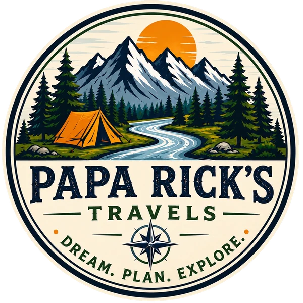 Papa Rick’s Travels circular mountain, sun, tent, river and compass logo